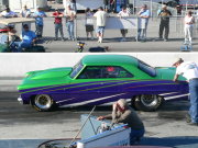 GREEN PURPLE NOVA PREPARING TO DO A BURNOUT